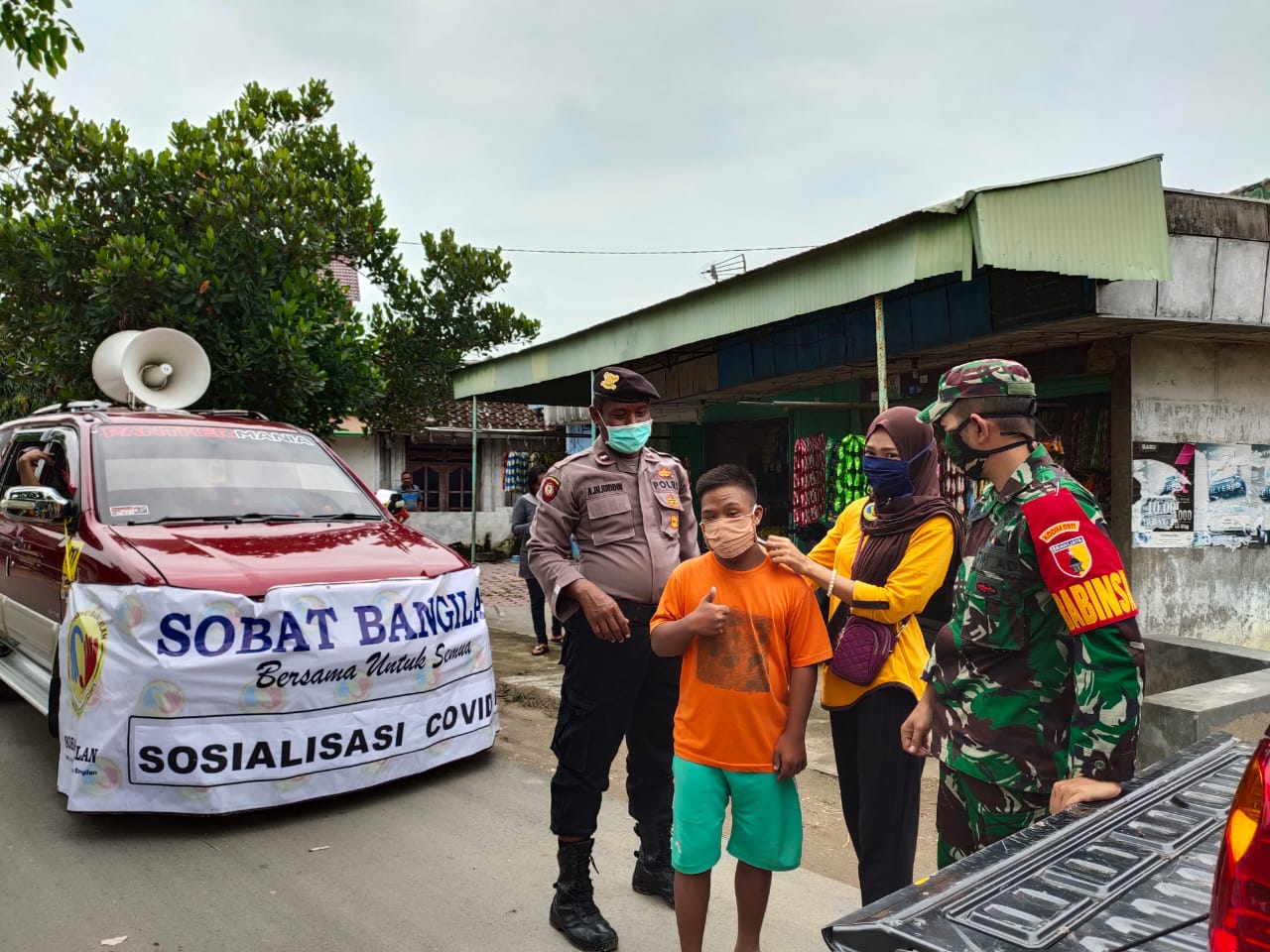 Sosialisasi dan Bagi Masker Aksi Cepat Hadapi Pandemi Virus Corona di Kecamatan Bangilan